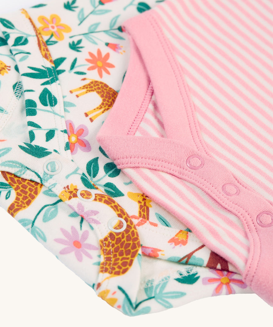 A closer look at the popper fasteners on the bottom of the Frugi Super Special 2 Pack Body - White Giraffes/Cosmos Stripe