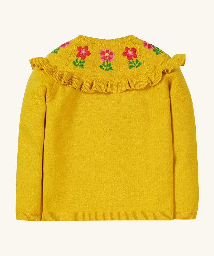 The back of the Frugi Romi Ruffle Cardigan - Dandelion/Flowers, showing the embroidered flowers and ruffle collar on the back