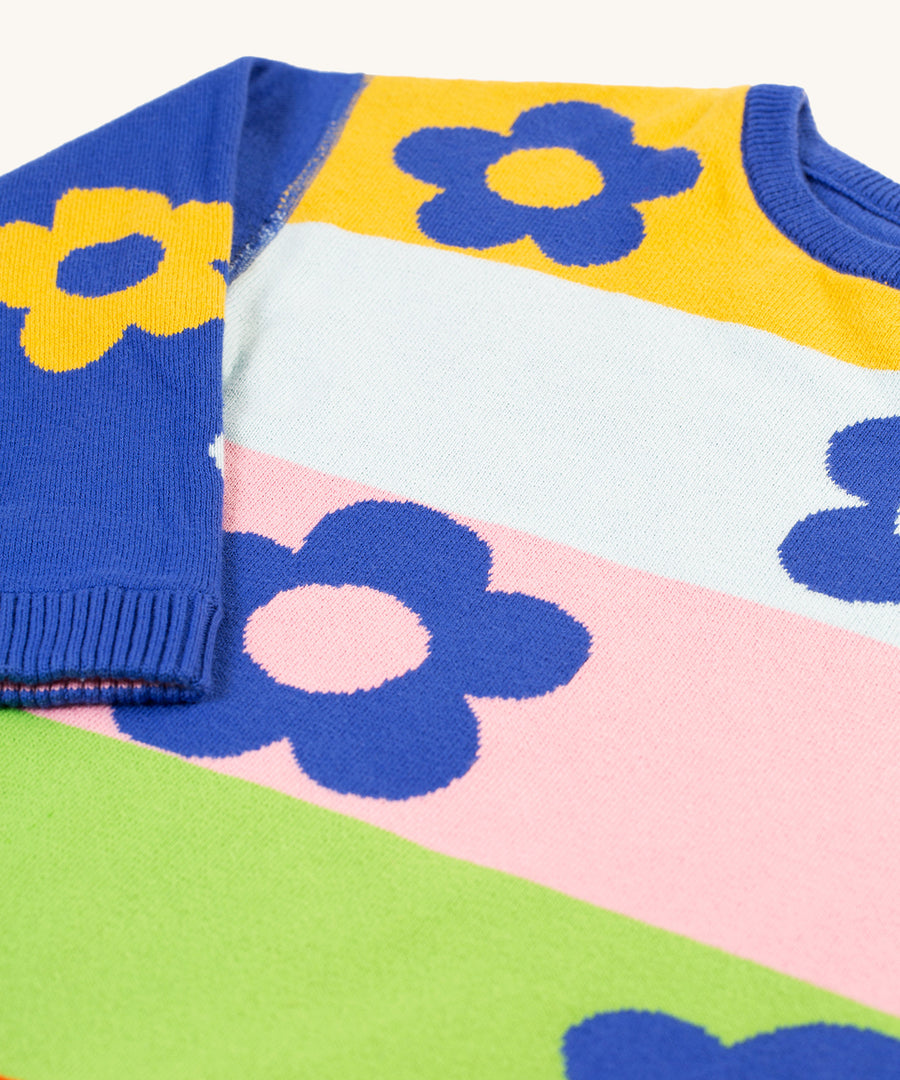 A closer look at the colour-block print on the Frugi Zola Reversible Knitted Dress - Blue Tang/Retro Floral