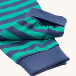 A closer look at the green and navy striped pyjama bottoms on the Frugi Jamie Jim Jams - Iguana Stripe/Camper