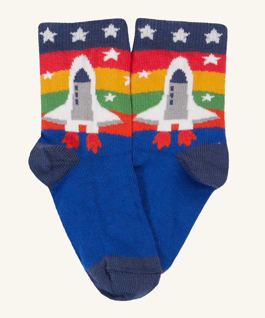 Frugi Rock My Socks 3 Pack - Space. Blue cotton socks with colourful strip ankles, and a rocket launching to space