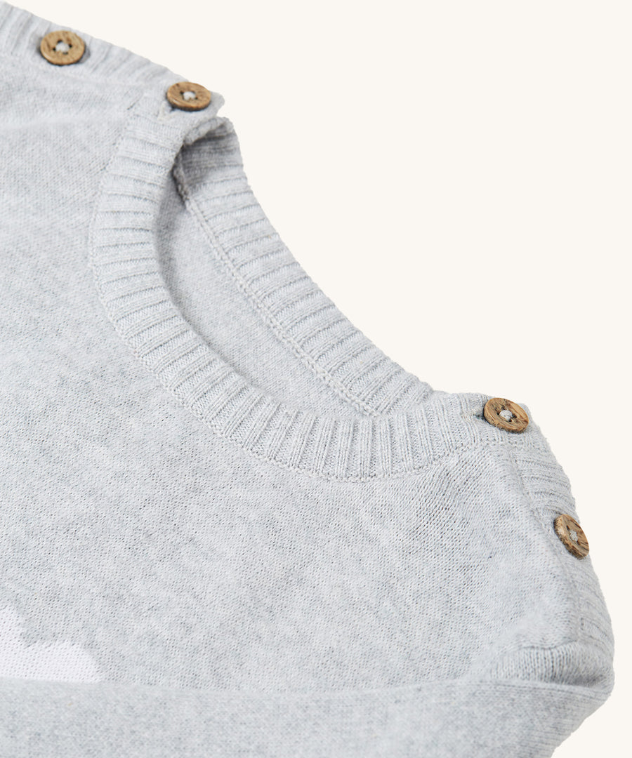 A look at the buttons on the neck and shoulders of the Frugi Kiera Knitted Dress - Grey Marl/Giraffe