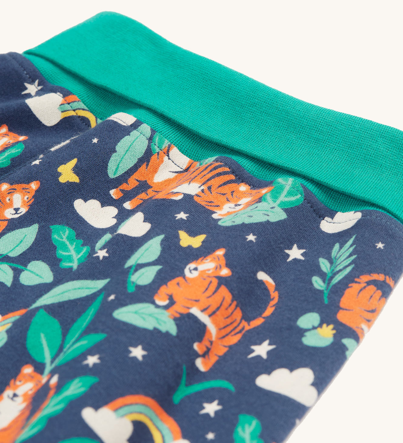 A look at the waist band and tiger print on the Frugi Parsnip Pants - Roarsome! 