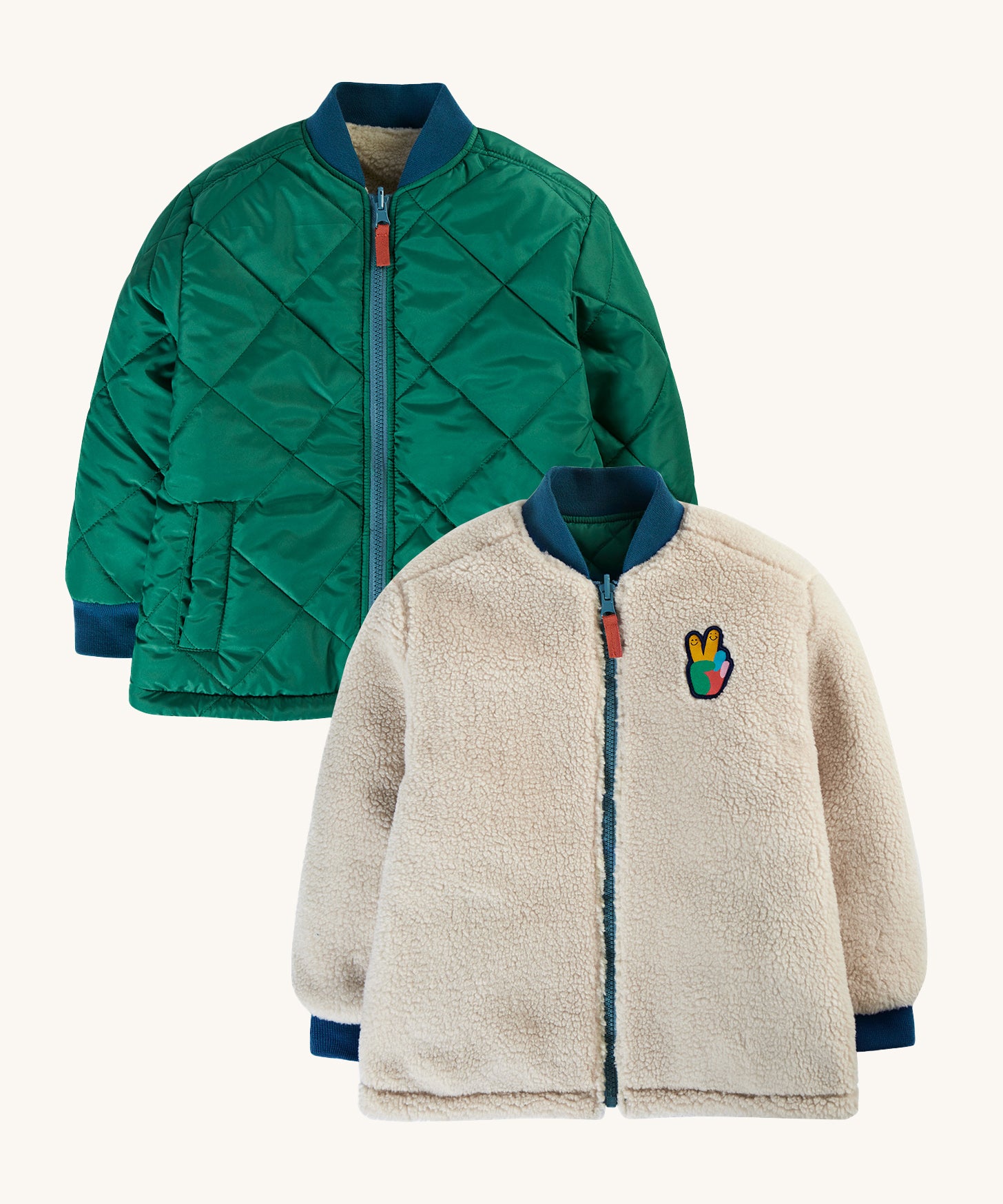 Frugi Robin Reversible Quilted Jacket - Teal/Moon. A padded green jacket with a soft fleece lining which is fully reversible