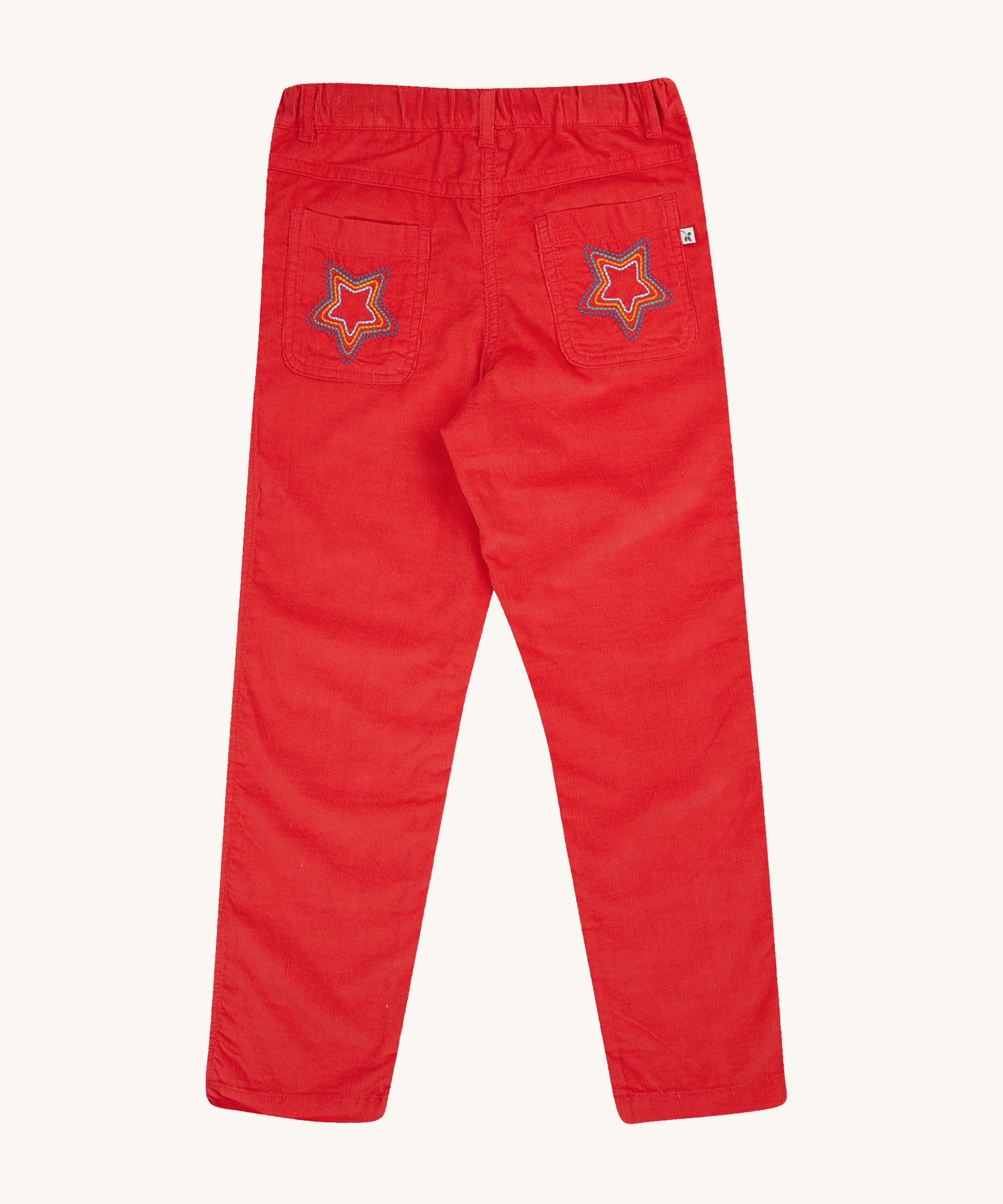 The back of the Frugi Clover Slim Cord Trousers - True Red. The back pockets each have an embroidered star