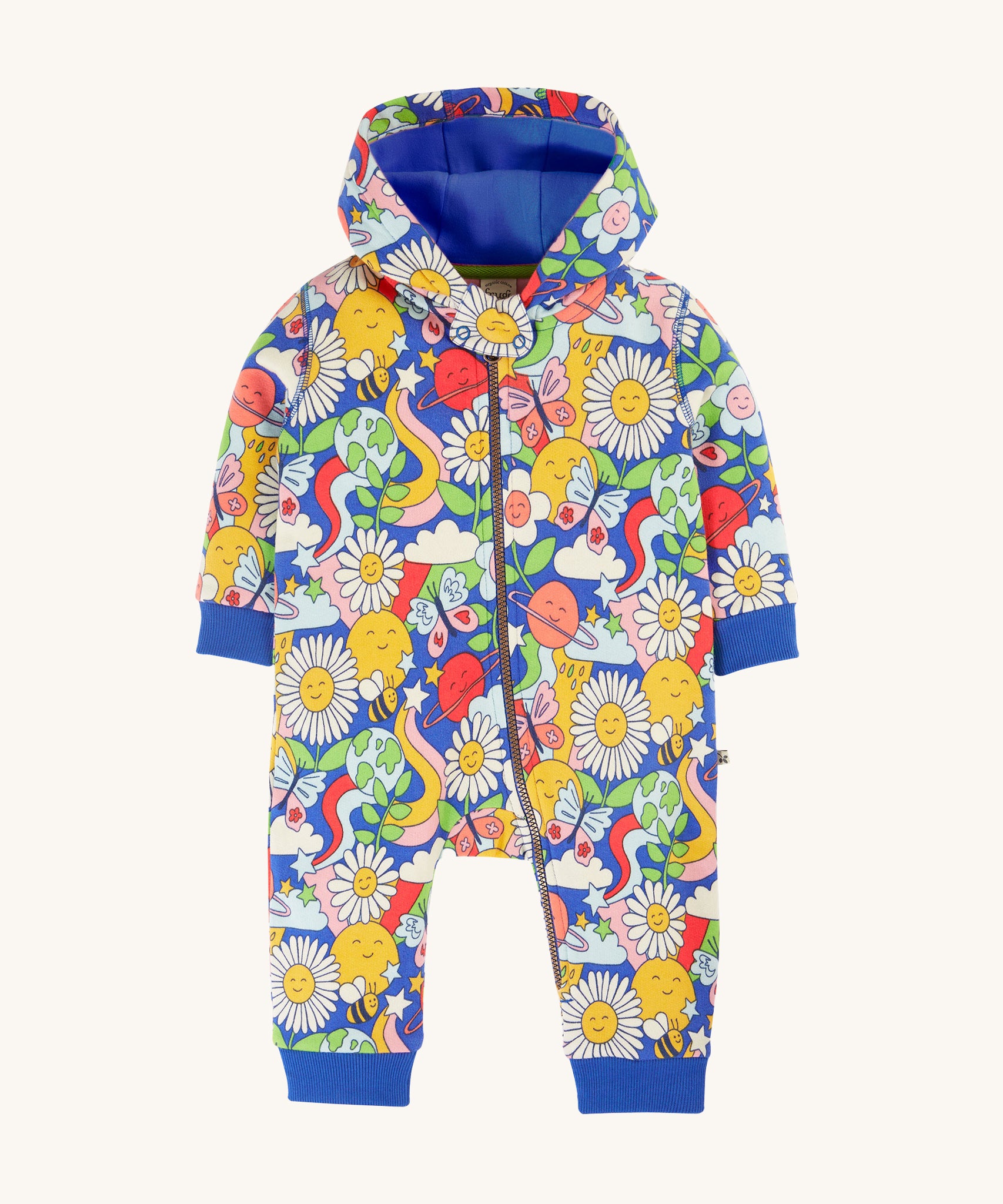 Frugi Snuggle Suit - Retro Happy. A soft and warm, hooded snuggle suit, made from organic cotton. With an all-over print, featuring smiley faces, daisies, butterflies, and bees