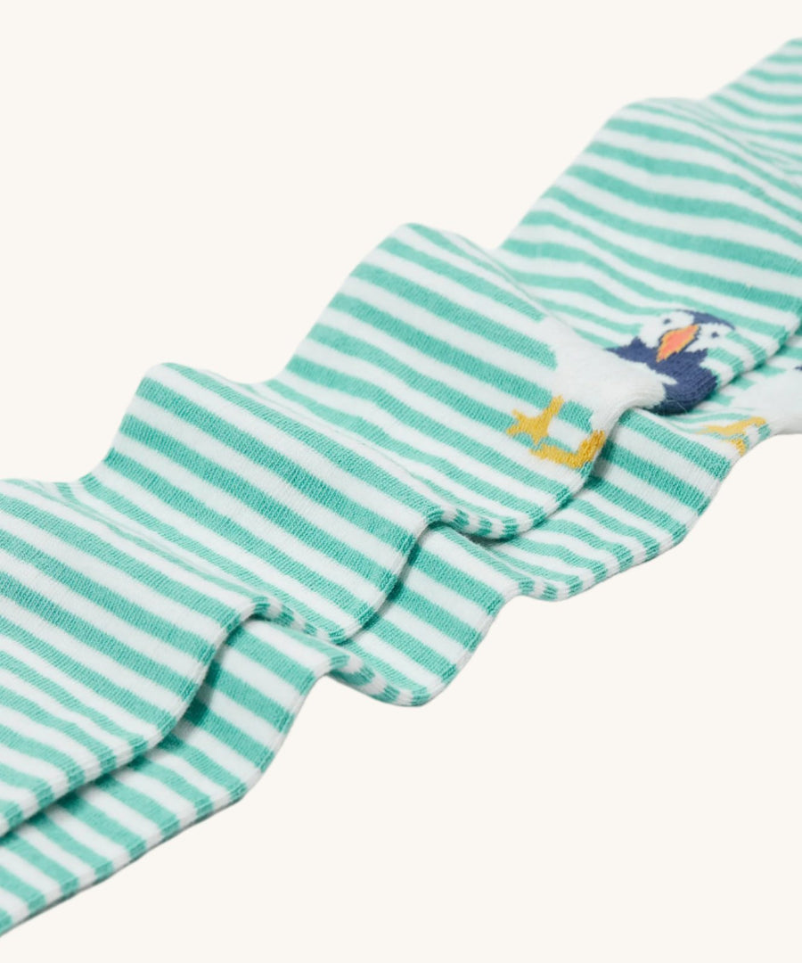 A closer look at the Frugi Norah Tights - Moss/Puffin stripes, and puffin knees