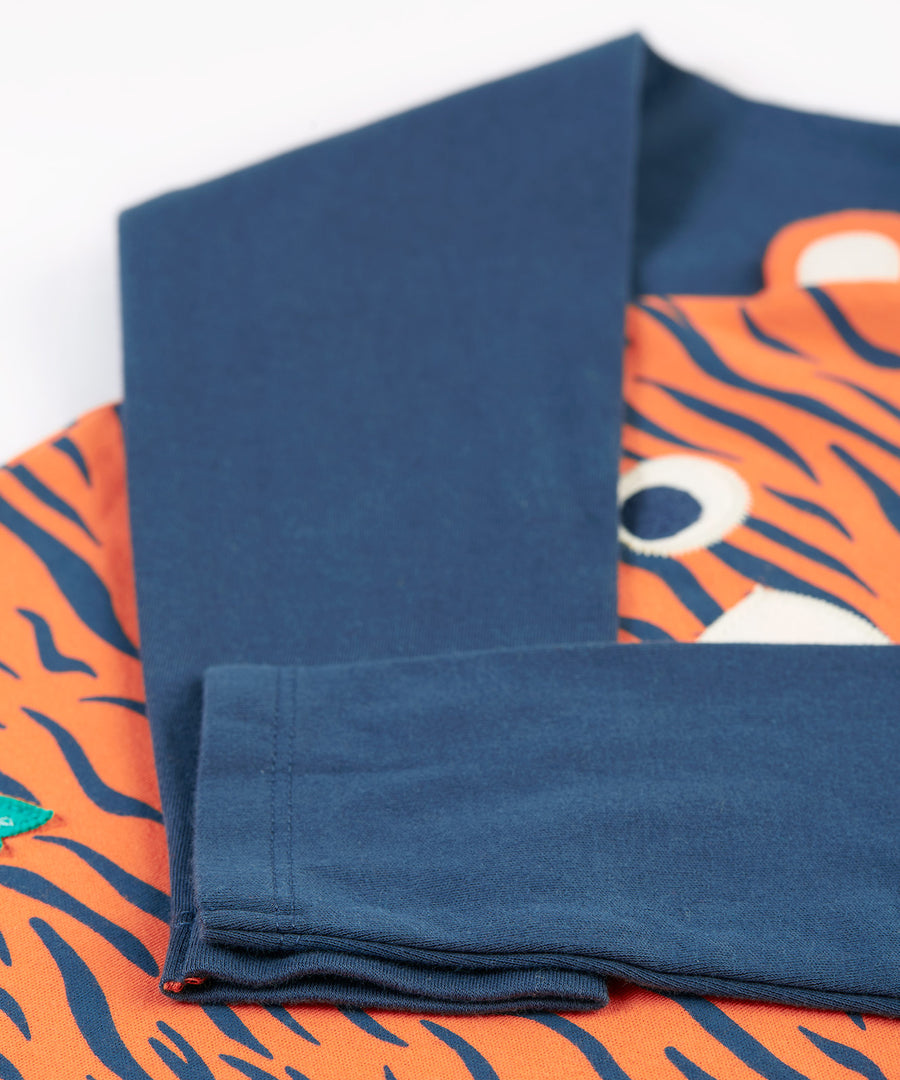 A look at the sleeves on the Frugi Happy Raglan Top - Tiger