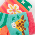 A closer look at the the giraffe and flower print on the Frugi Grippy Socks 2 Pack - Giraffe