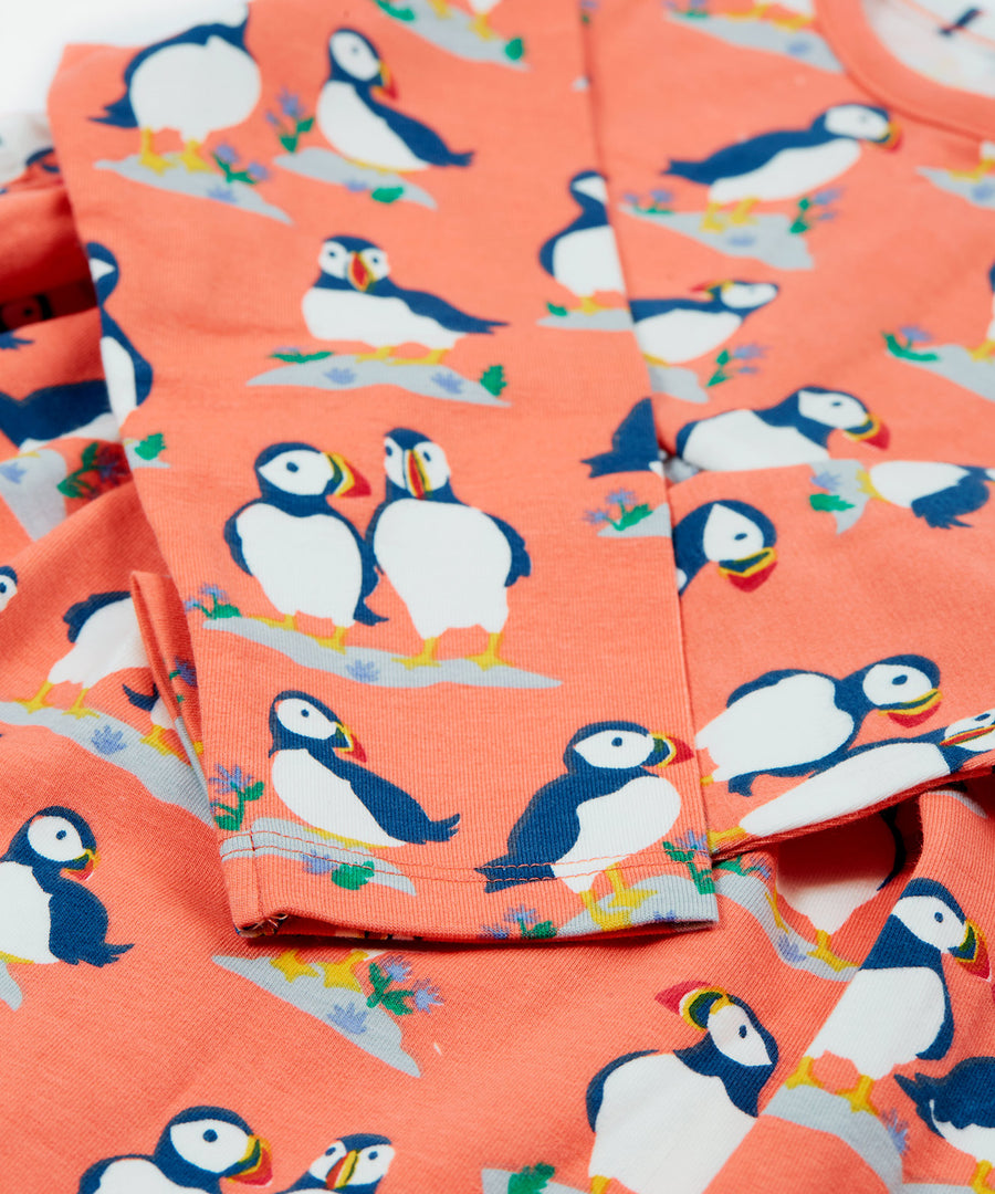 A look at the sleeves of the Frugi Dee Dress - Puffin Pals, showing the cute Frugi puffin print