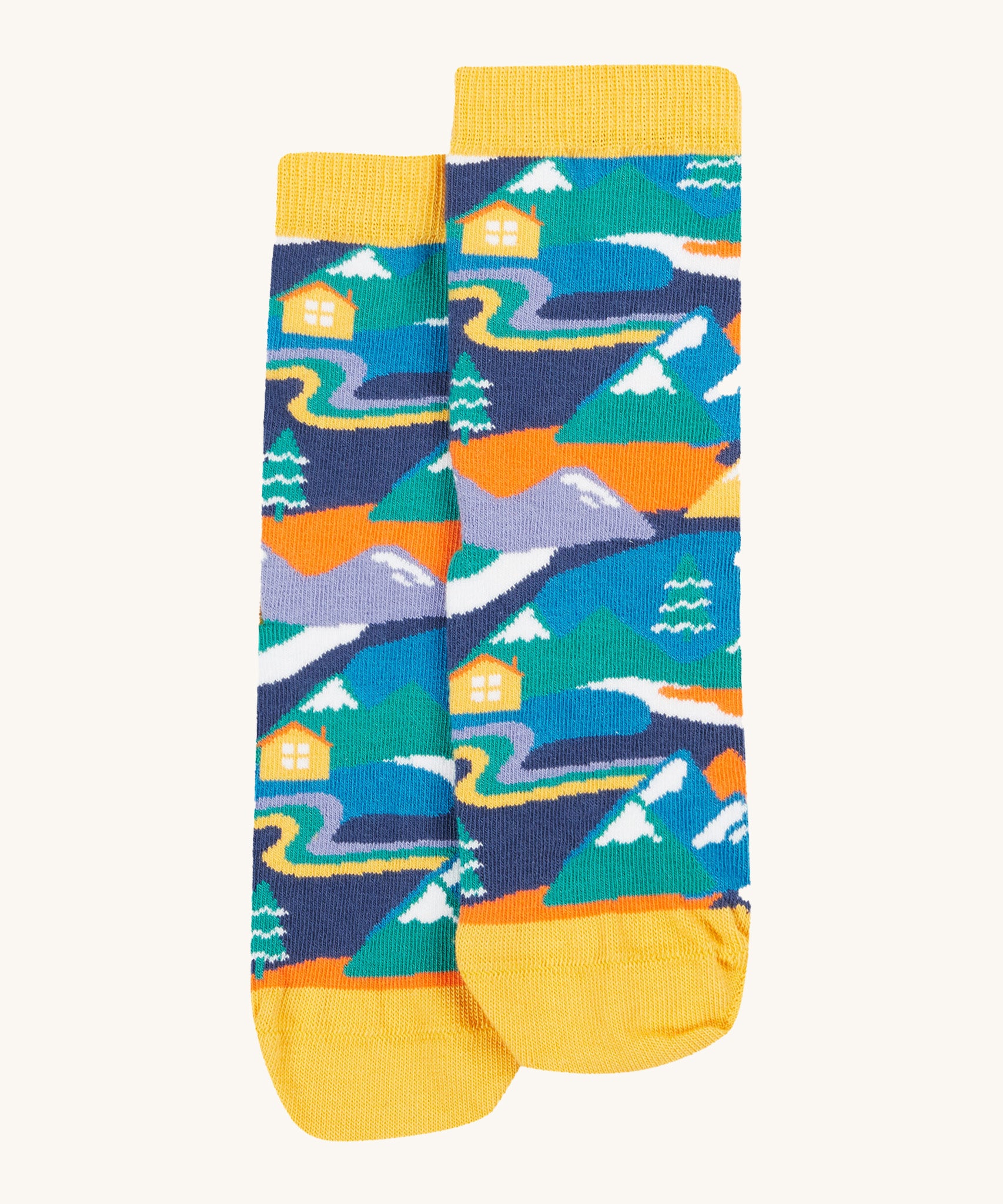 A fun and colourful mountain and lodge design on the Frugi Rock My Socks 3 Pack - Alpine Adventures