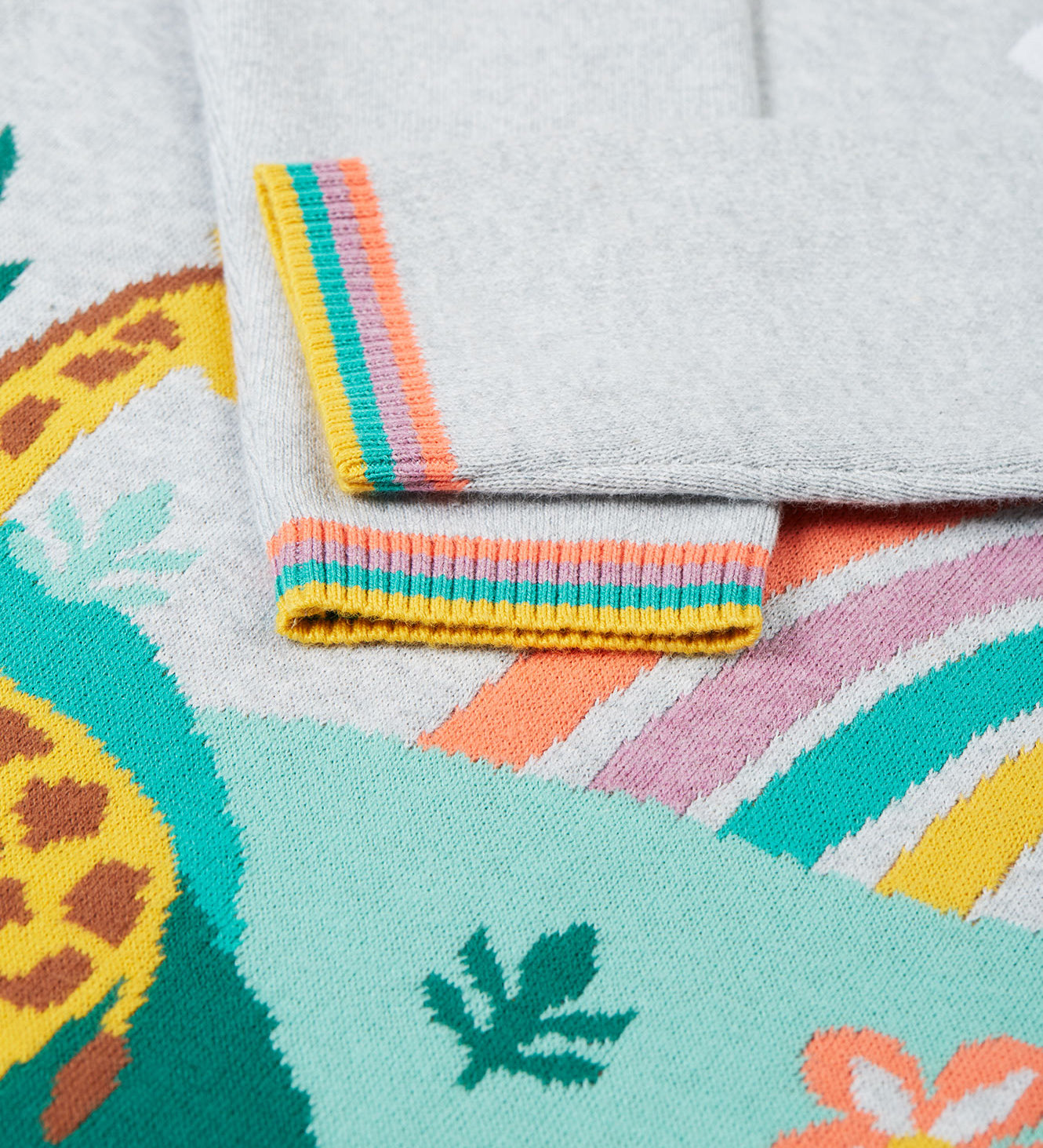 A closer look at the striped cuffs on the Frugi Kiera Knitted Dress - Grey Marl/Giraffe