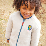 Veste matelassée réversible Frugi Robin - Bleu sarcelle/lune