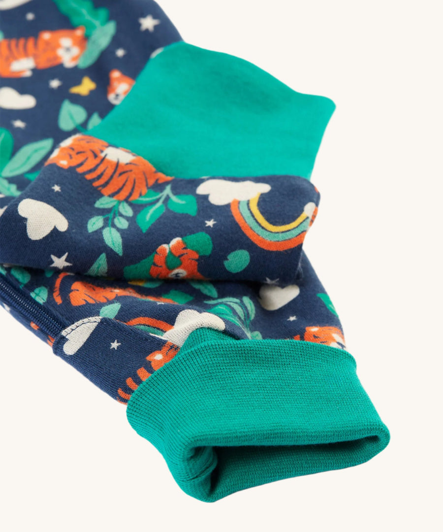 A closer look at the adjustable ankle cuffs on the Frugi Zelah Zip Up All In One - Roarsome!