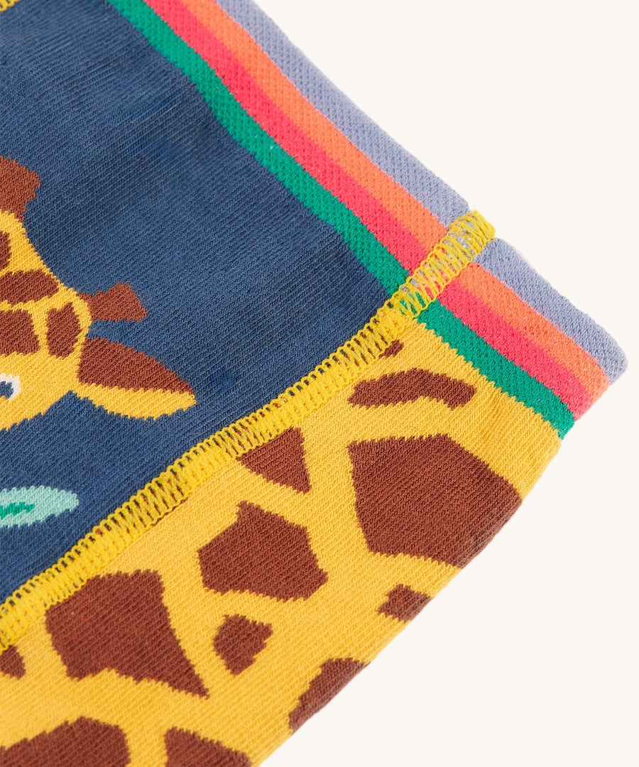 A closer look at the print and stitching on the Frugi Little Knitted Leggings - Giraffe