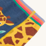 A closer look at the print and stitching on the Frugi Little Knitted Leggings - Giraffe