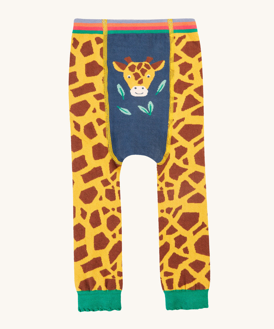 Frugi Little Knitted Leggings - Giraffe. A fun giraffe print leg, with giraffe face detail on the front, a rainbow waist band and green ankle cuffs