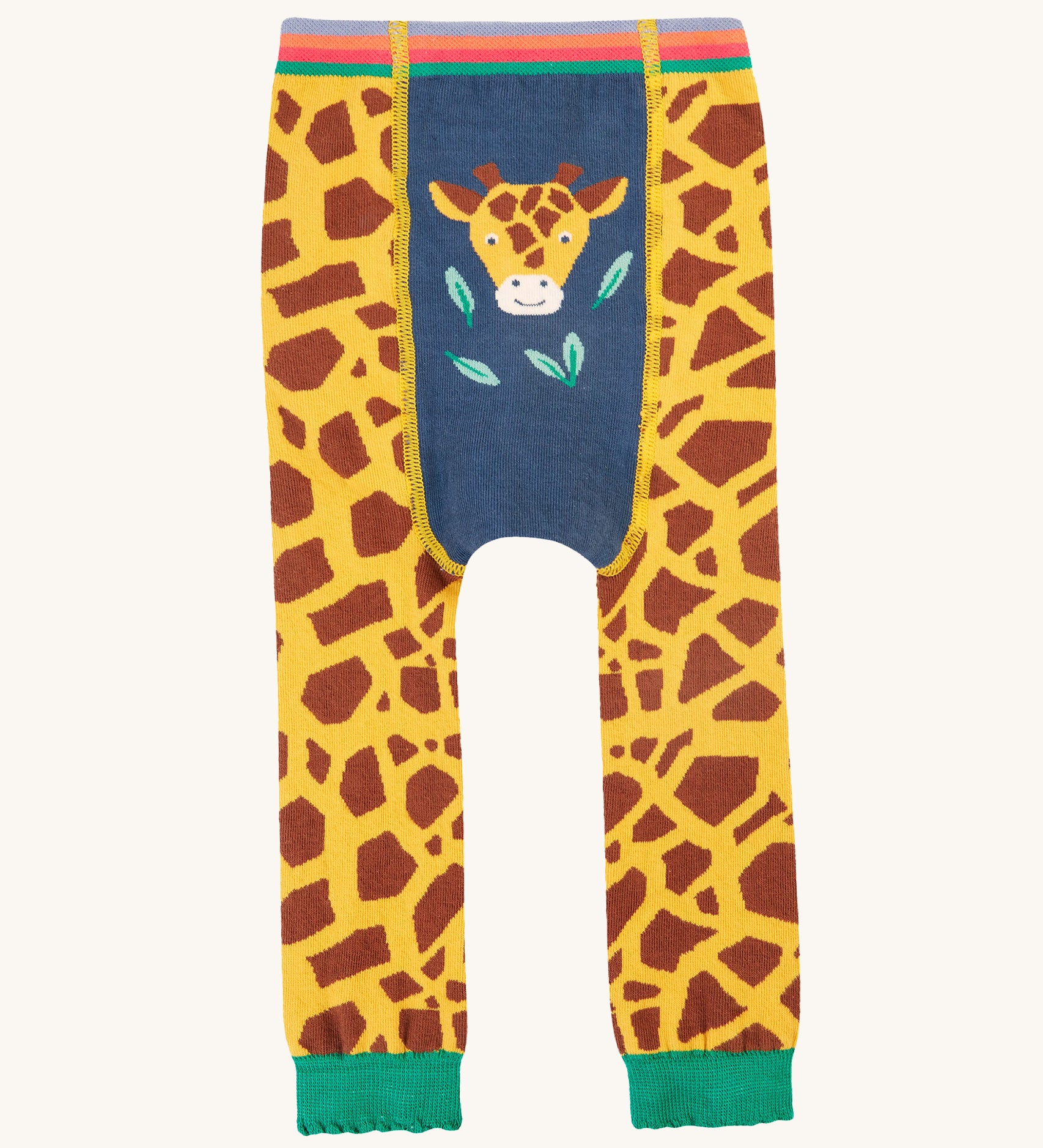 Frugi Little Knitted Leggings - Giraffe. A fun giraffe print leg, with giraffe face detail on the front, a rainbow waist band and green ankle cuffs