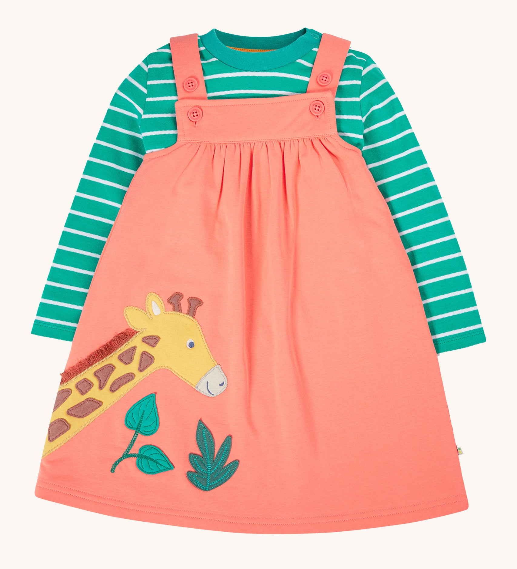 Frugi Paige Pinafore Outfit - Cantaloupe/Iguana Breton. A lovely peach pinafore dress with a giraffe and leaf applique on the front, and a green and white stripe top