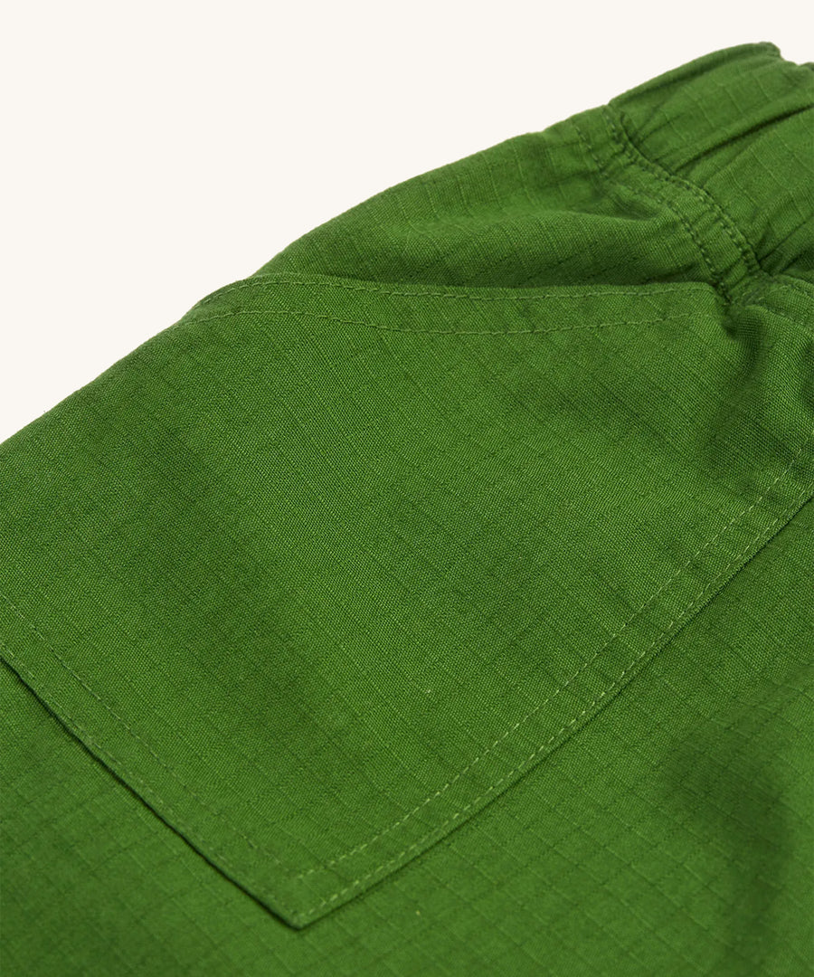 A closer look at the pockets on the Frugi Pioneer Trousers - Jungle Green