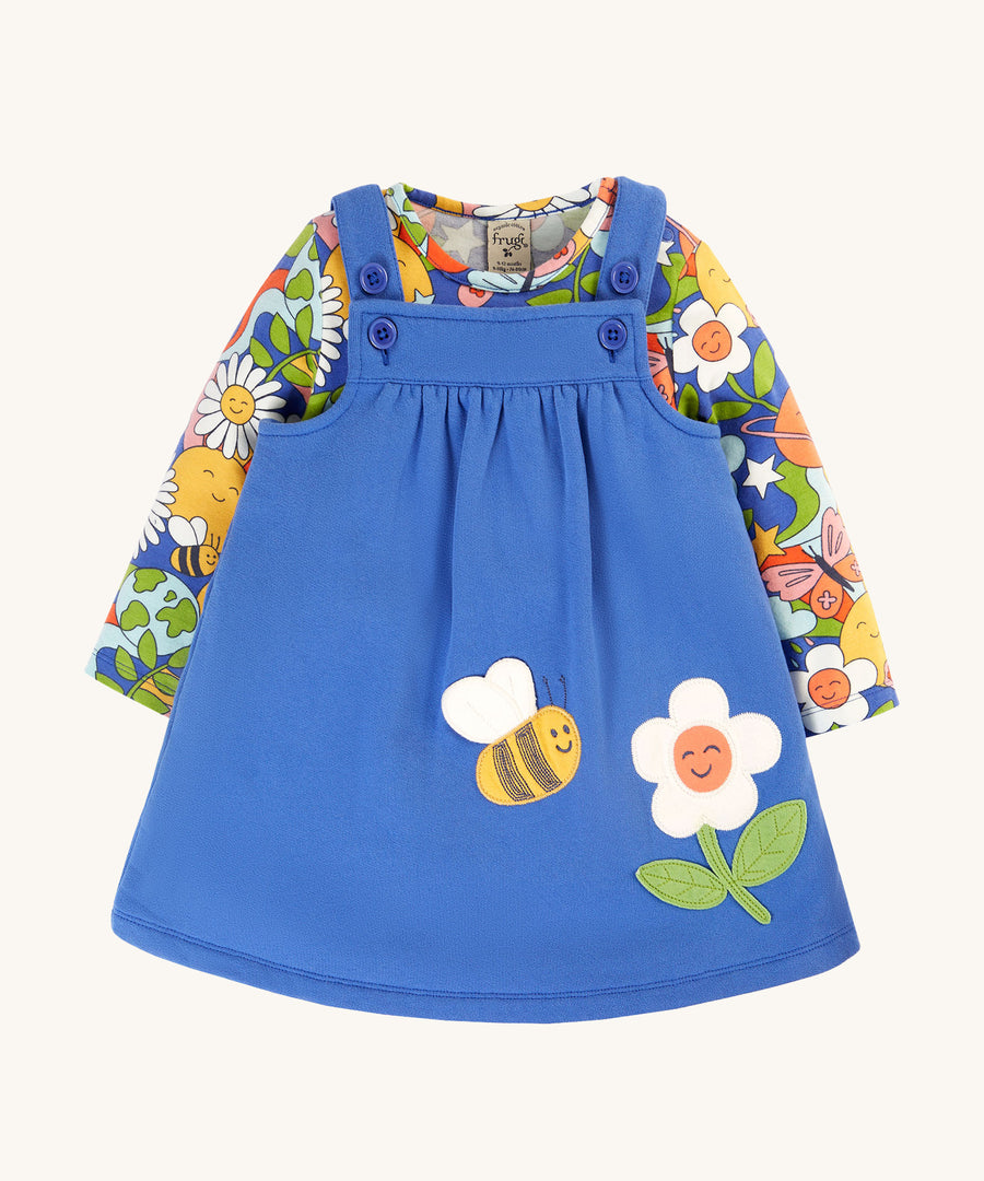 Frugi Polly Pinafore Outfit - Blue Tang/Retro Happy. A beautiful, organic cotton outfit with a blue, adjustable strap pinafore dress, and a long sleeve Retro Happy print top.