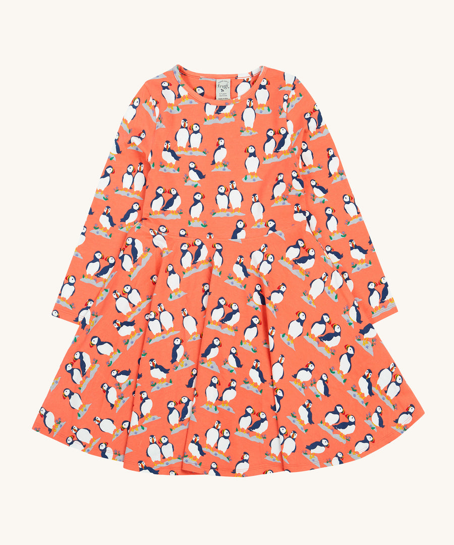 Frugi Sofia Skater Dress - Puffin Pals. A lovely peach dress with Frugi puffin print