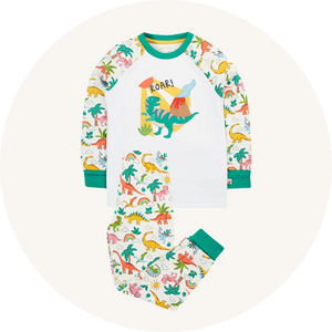 Frugi dinosaur pyjamas on cream background to represent Frugi pyjamas at Babipur.