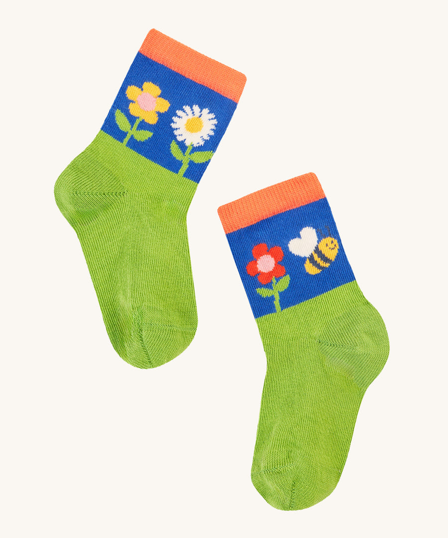 Frugi Little Socks 3 Pack - Retro Happy. A green and blue pair of socks, with colourful flowers and bee print