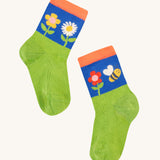 Frugi Little Socks 3 Pack - Retro Happy. A green and blue pair of socks, with colourful flowers and bee print