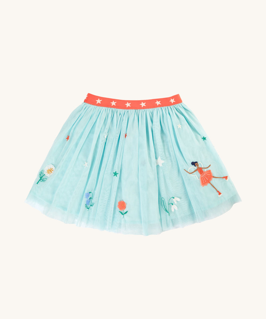 Frugi Scarlet Twirly Skirt - Glacier/Fairy. A gorgeous, light blue skirt made from tulle and lined with satin, with embroidered flowers and a fairy, and a coral elasticated waist band with white stars