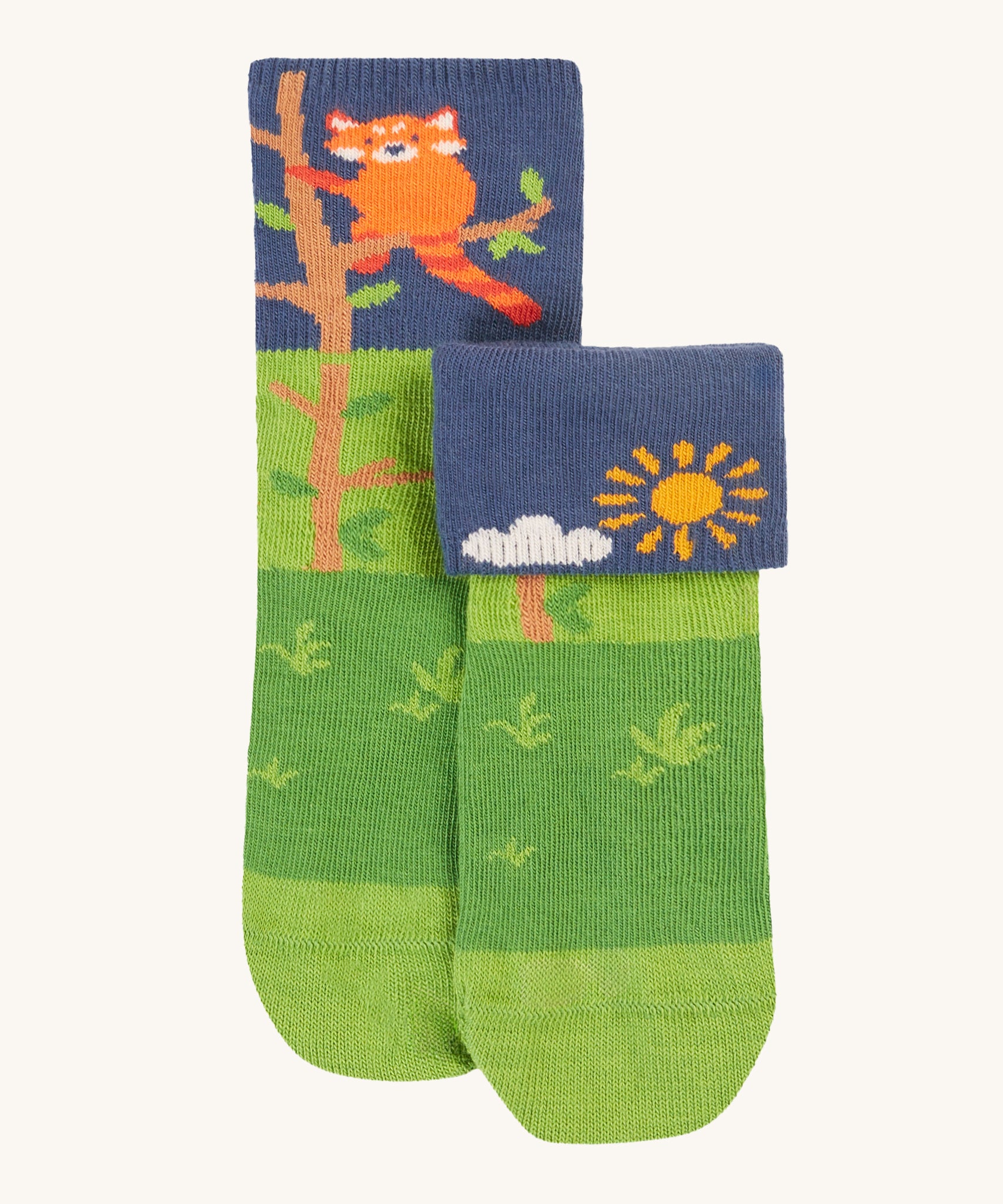 The green pair of the Frugi Fun Fold Over Socks - Red Panda 2 Pack. These socks are green with a navy blue top with a red panda and sun design