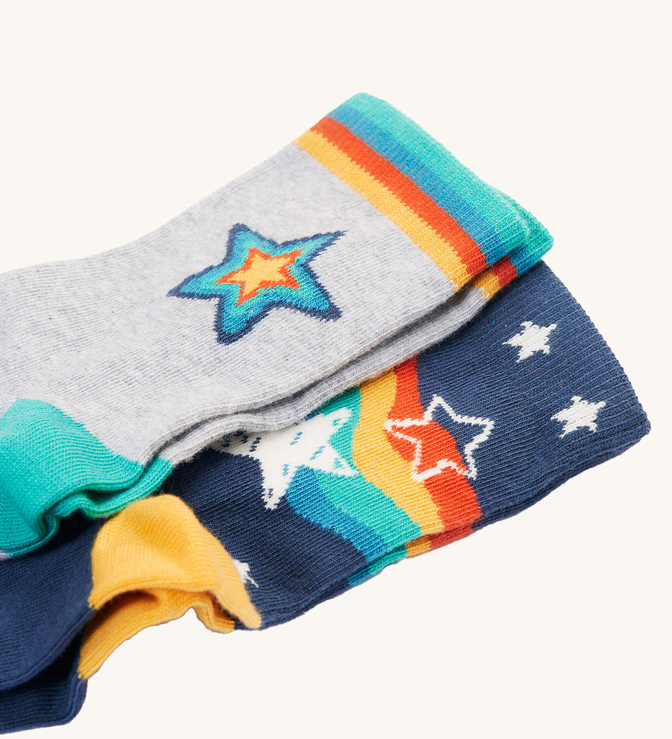 A closer look at the star prints on the Frugi Rock My Socks - Stars 2 Pack