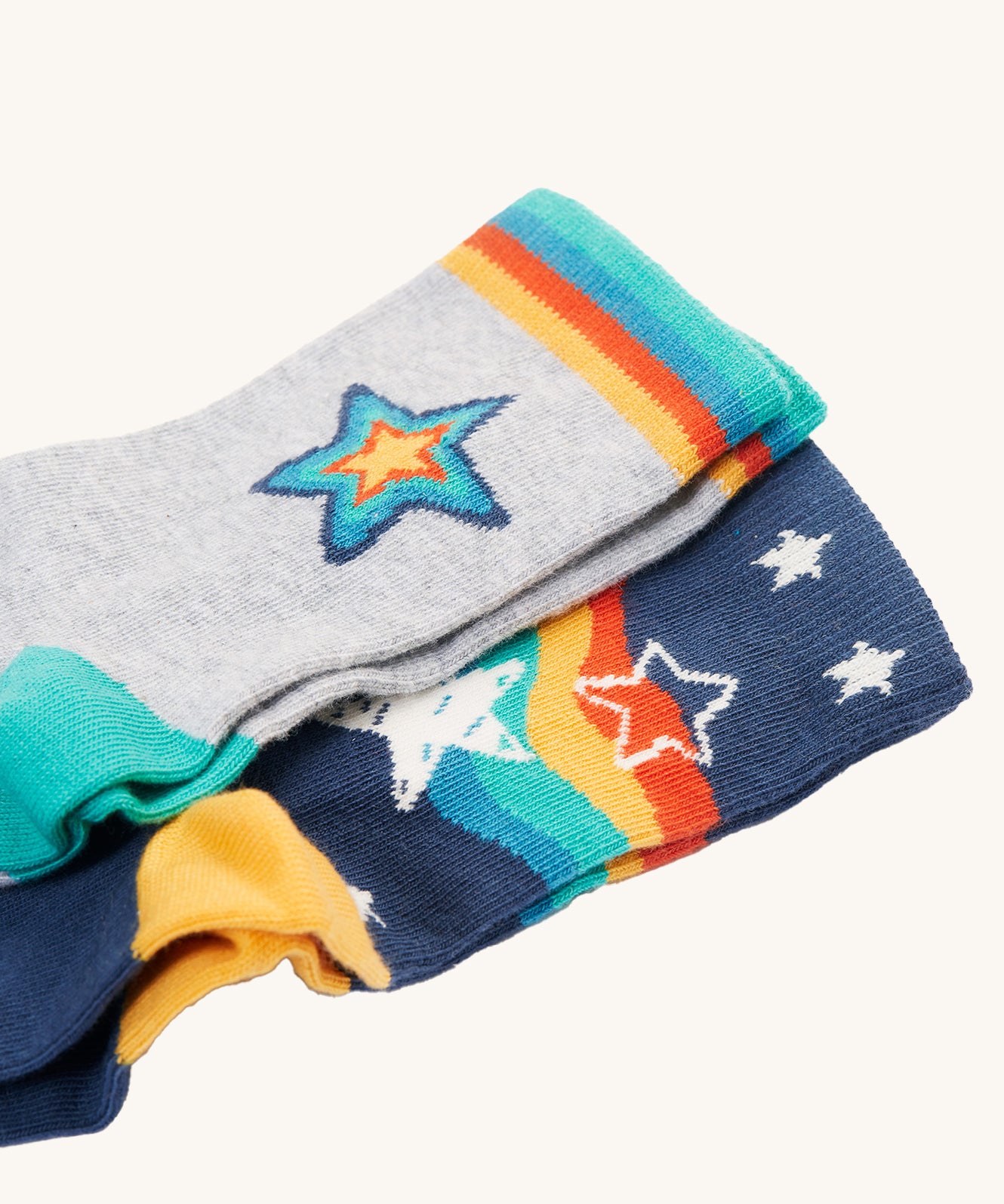 A closer look at the star prints on the Frugi Rock My Socks - Stars 2 Pack