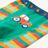 A closer look at the tractor print on the Frugi Little Knitted Leggings - Rainbow Stripe/Tractor