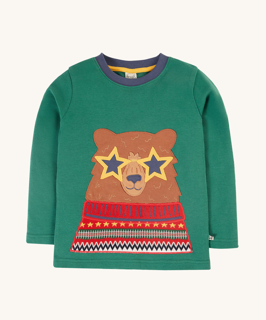 This long-sleeved Terrific Appliqué Top from Frugi is made from soft organic cotton in Teal  with a Fairisle Bear appliqué on the front. With a stretchy rib neckline.