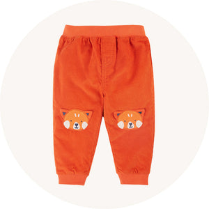 Frugi red panda cord trousers on cream background to represent Frugi trousers and shorts range at Babipur.