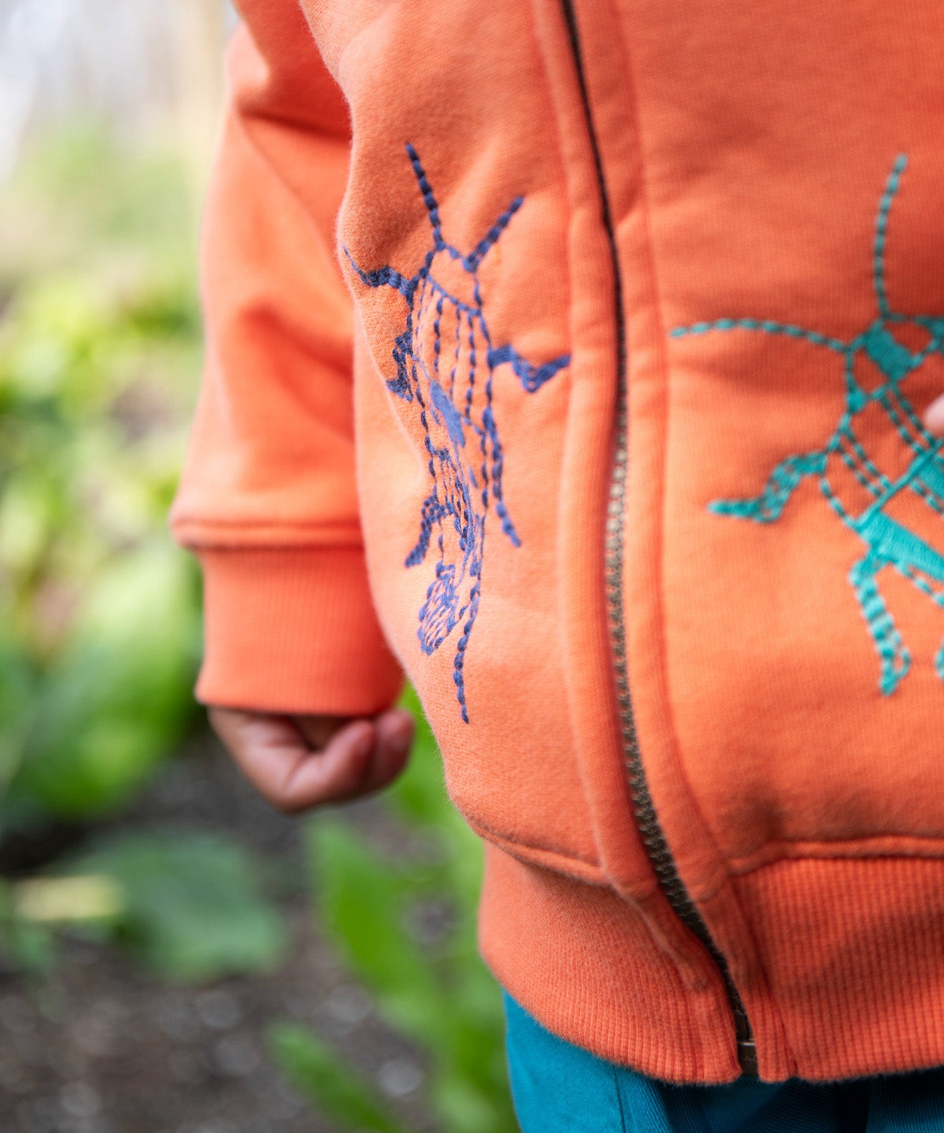 Frugi orange zip hoodie beetles design front detail