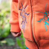 Frugi orange zip hoodie beetles design front detail