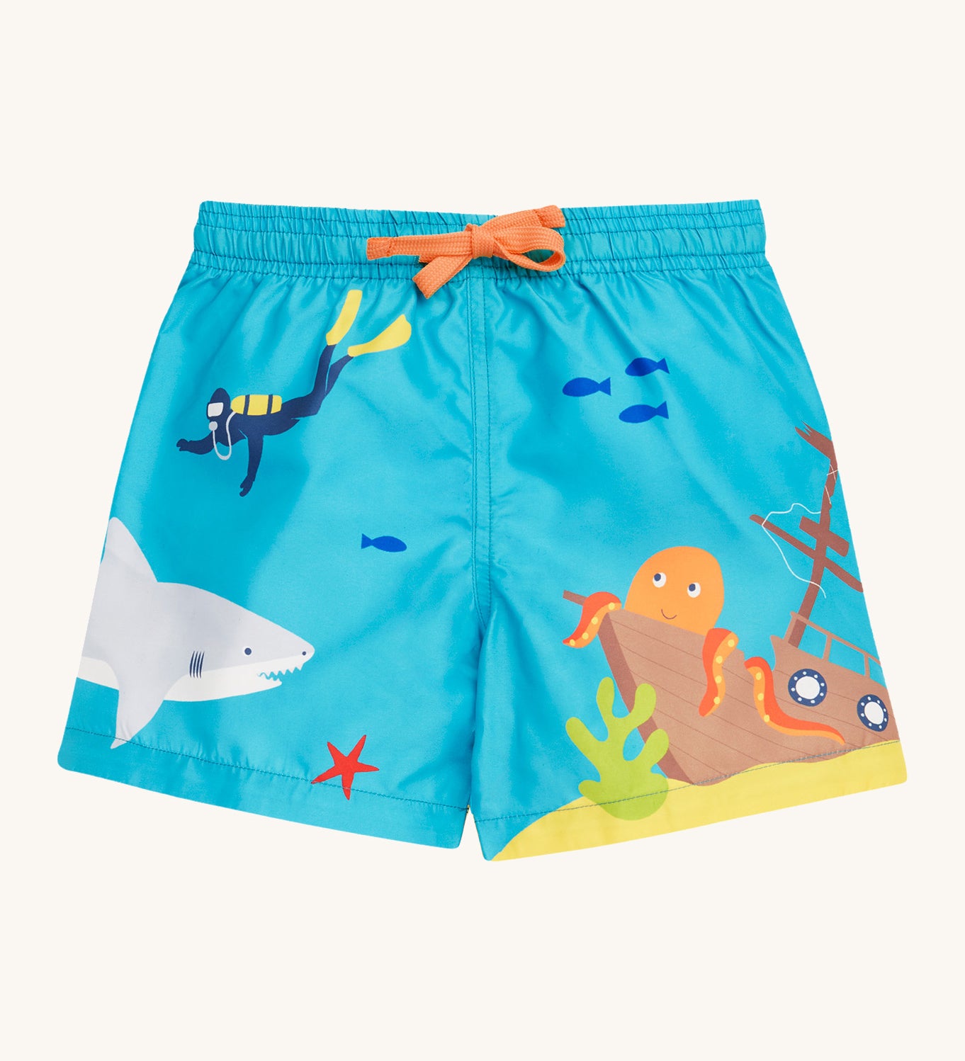 Frugi blue swim shorts deep dea diver design on a cream background.