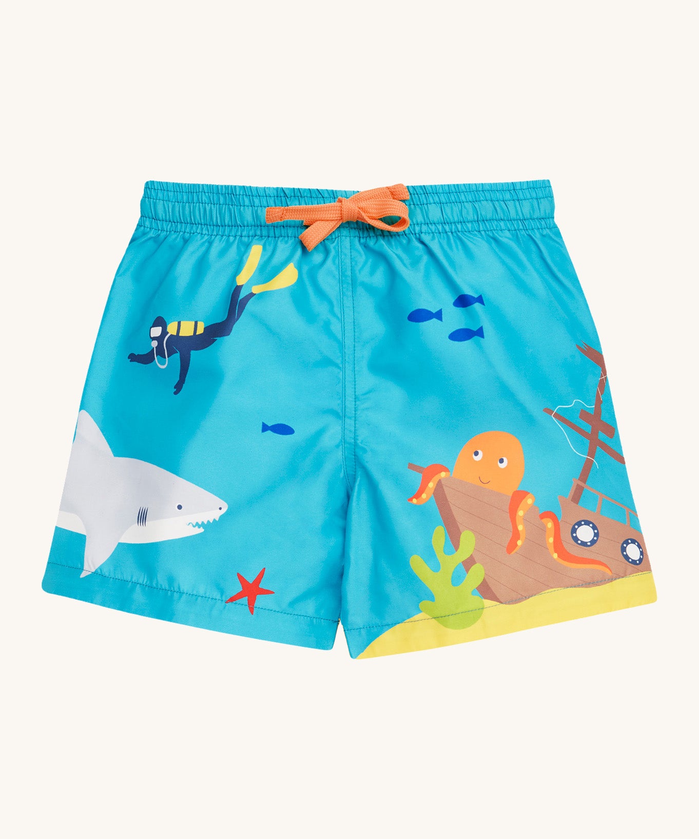 Frugi blue swim shorts deep dea diver design on a cream background.