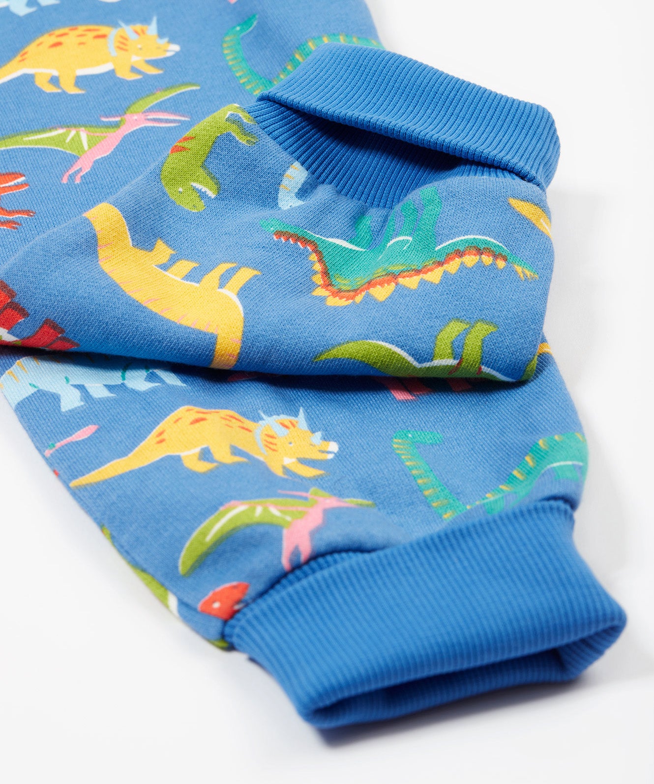 Frugi blue snuggle suit dino roar leg cuff detail