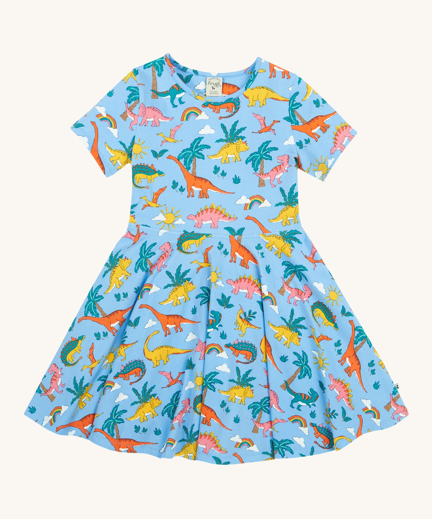 Frugi blue skater dress dinoland design on a cream background.