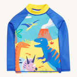 Frugi blue and yellow rash vest dino design on a cream background.