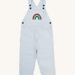 Frugi blue stripe dungarees rainbow design on a cream background.