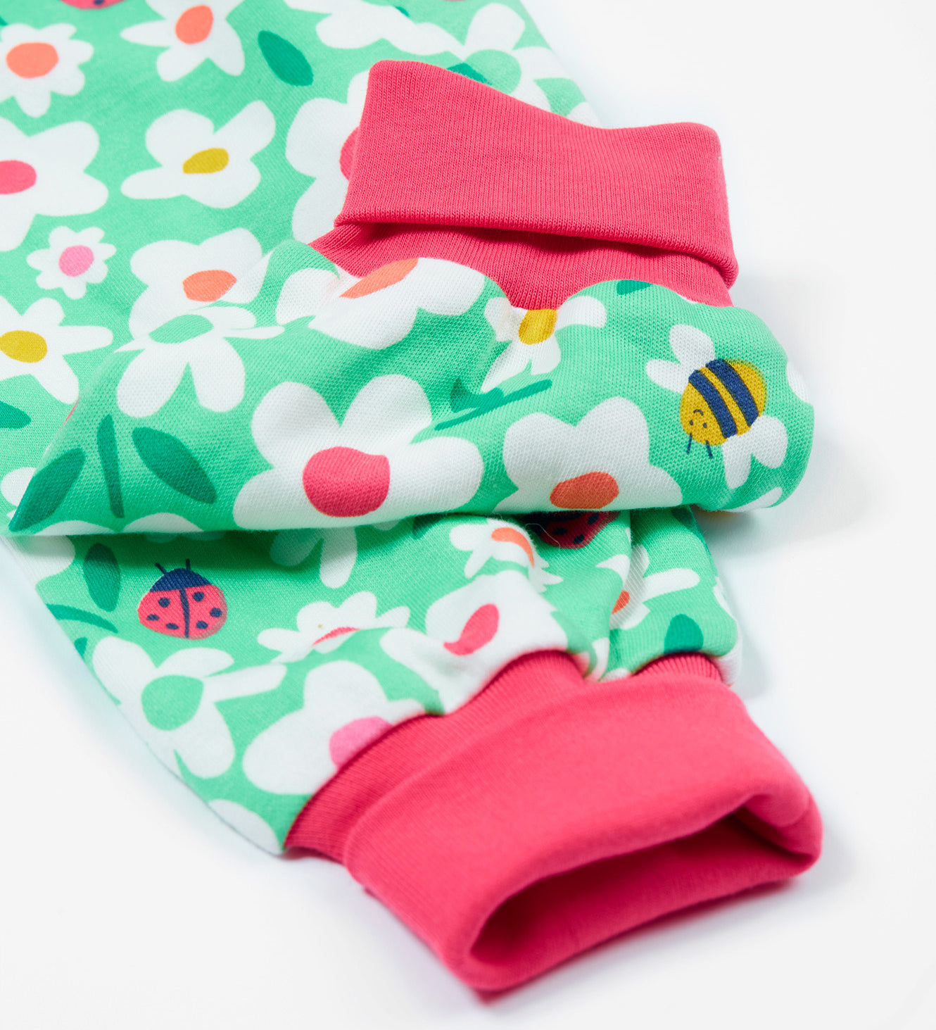 Frugi green parsnip pants busy bugs cuff detail