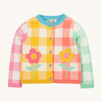 Frugi multicoloured check cardigan daisy design on a cream background.