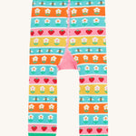 Frugi knitted leggings daisy and ladybird design back detail on a cream background