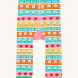 Frugi knitted leggings daisy and ladybird design back detail on a cream background