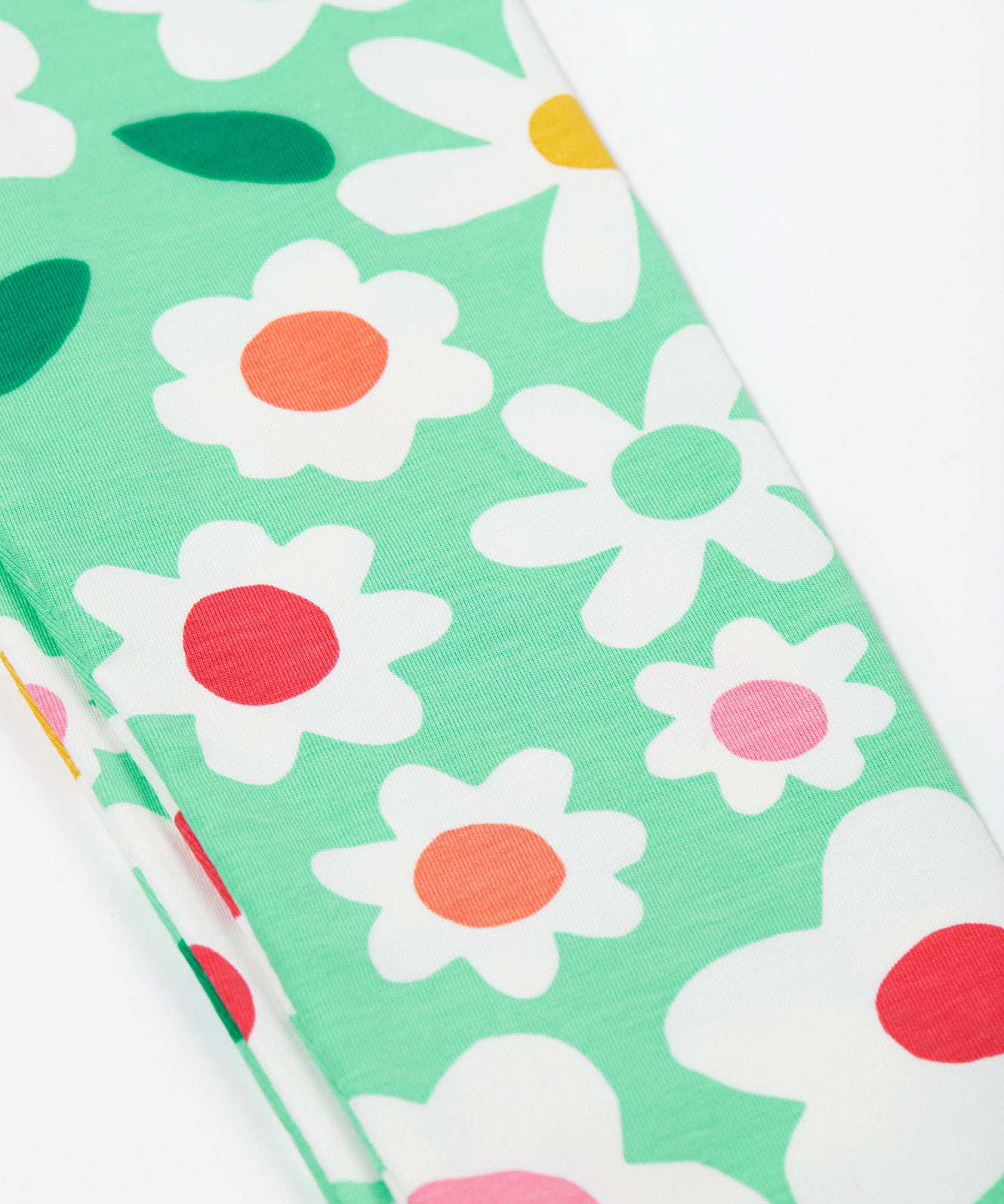 Frugi green leggings daisy print detail