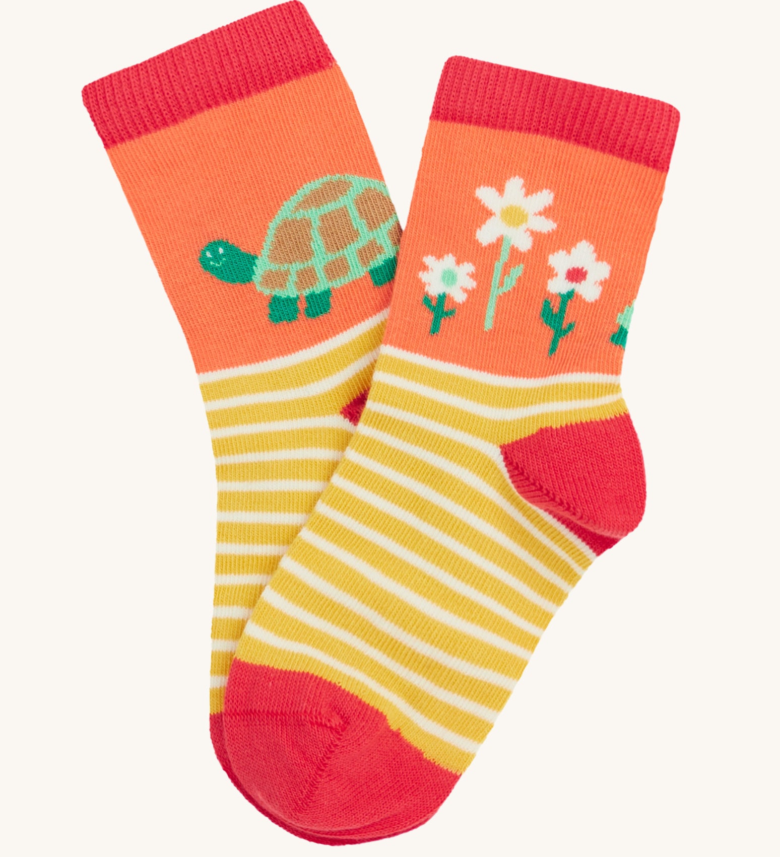 Frugi single little sock daisy design on a cream background